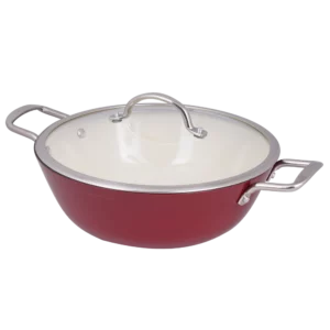 Red enamel sauté pan with a glass lid and stainless steel handles.